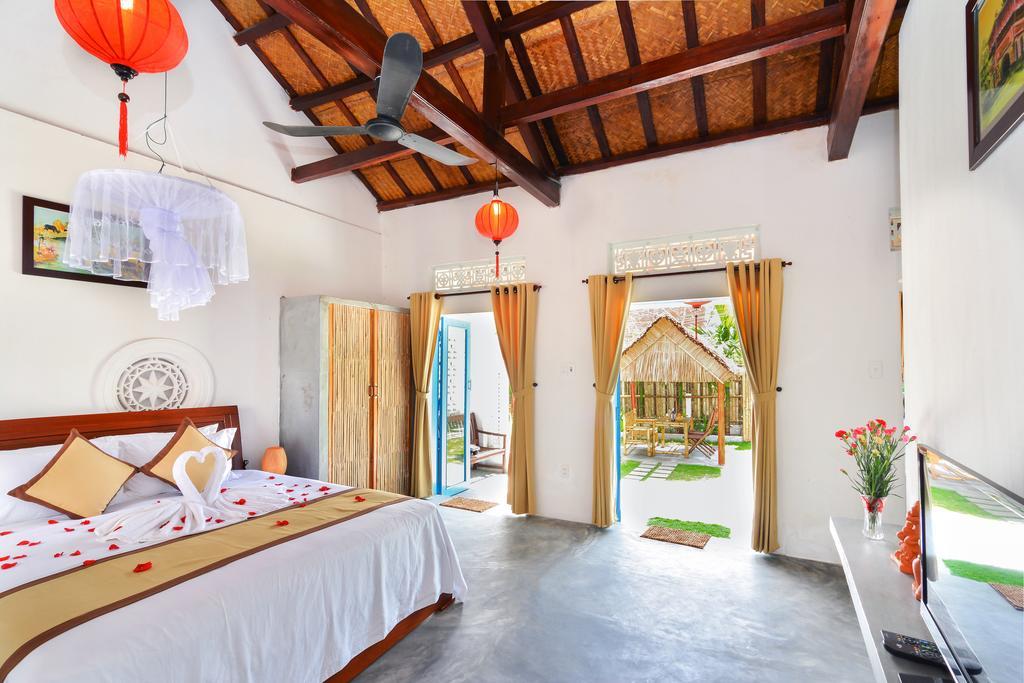 Local Beach Homestay Hoi An Bilik gambar